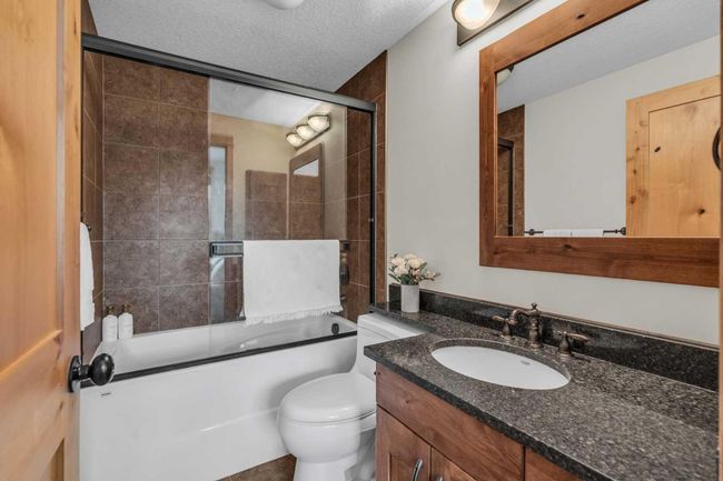 201 - 2100B Stewart Creek Dr, Condo with 2 bedrooms, 3 bathrooms and 1 parking in Canmore AB | Image 29