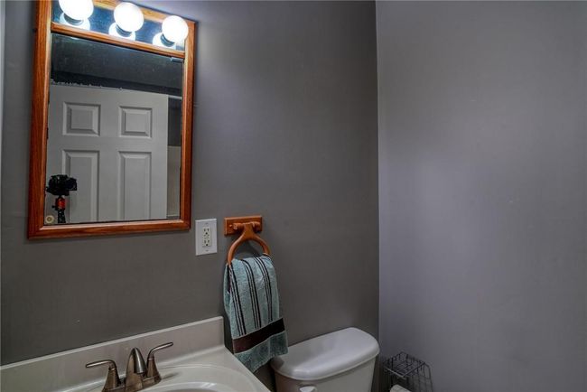 Bathroom featuring toilet and sink | Image 27