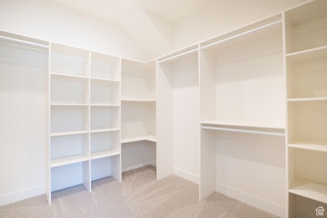 Walk in closet featuring carpet flooring | Image 14