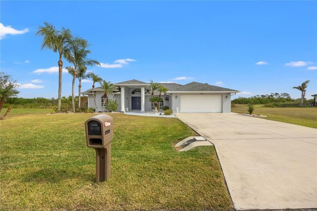 12950 Sw Pembroke Cir S, House other with 3 bedrooms, 2 bathrooms and null parking in LAKE SUZY FL | Image 46