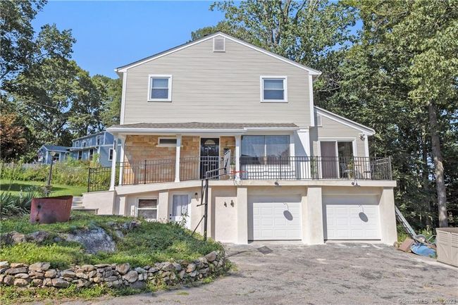 Exterior offering 2 Large Under House Garages | Image 31