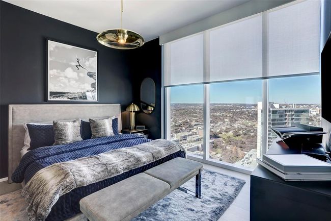 Bedroom with wood finished floors | Image 9
