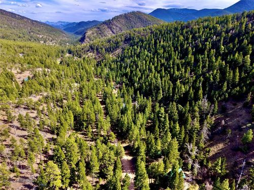 3925 Little Wolf Creek Rd, Wolf Creek, MT, 59648-8530 | Card Image