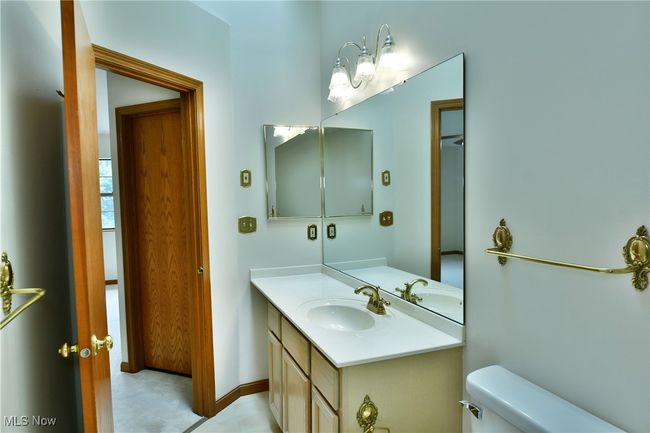 Bathroom with vanity and toilet | Image 45