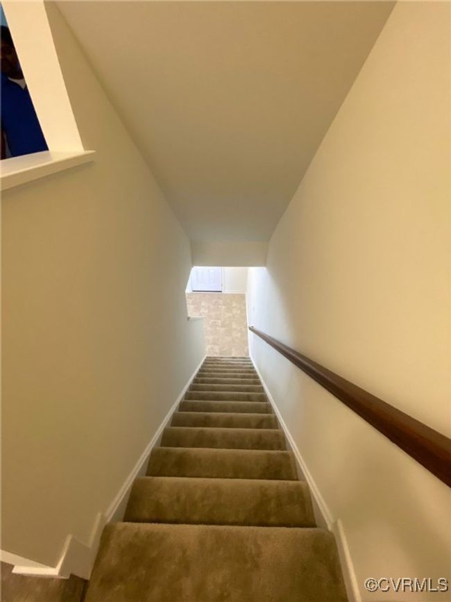 Stairs with baseboards and carpet floors | Image 11