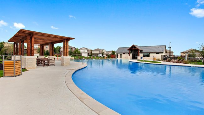 Community pool featuring a patio, a residential view, and a pergola | Image 40