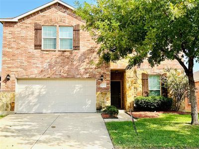 View of front of house with a front yard and a garage | Image 2