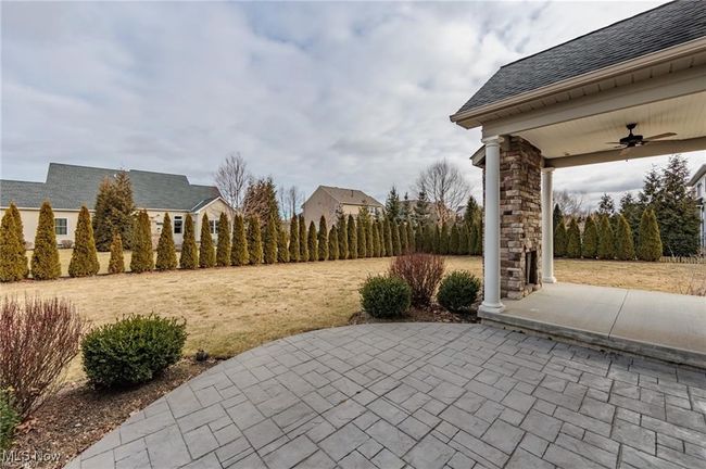 View of patio / terrace featuring ceiling fan | Image 18