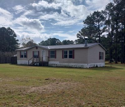 Manufactured / mobile home featuring a front yard | Image 2