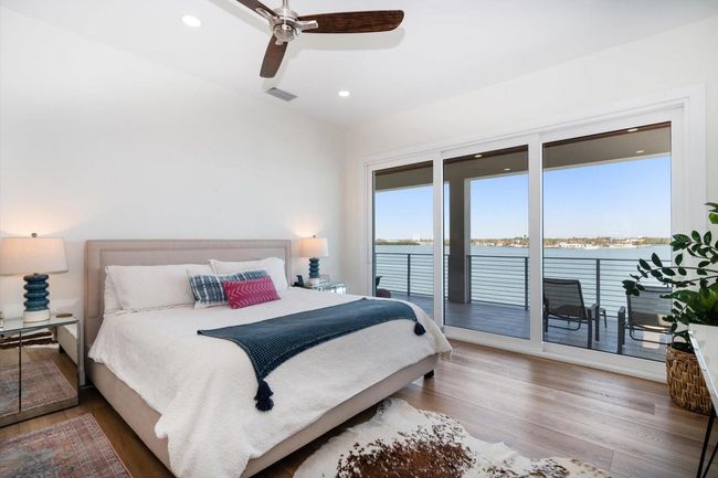 Primary Suite with balcony on the bay. Wake up to beautiful sunrise every morning! | Image 53