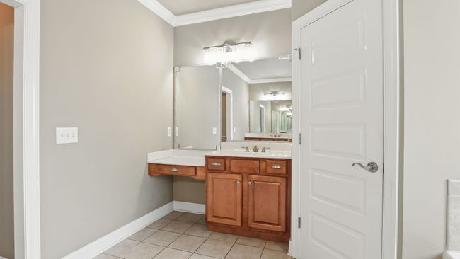 Double vanity with one vanity desk. | Image 19