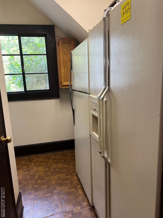 Large storage area with 2 refrigerators | Image 32