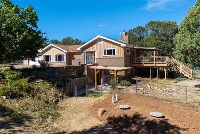 Corner View - Covered Porch and Basement Door | Image 3