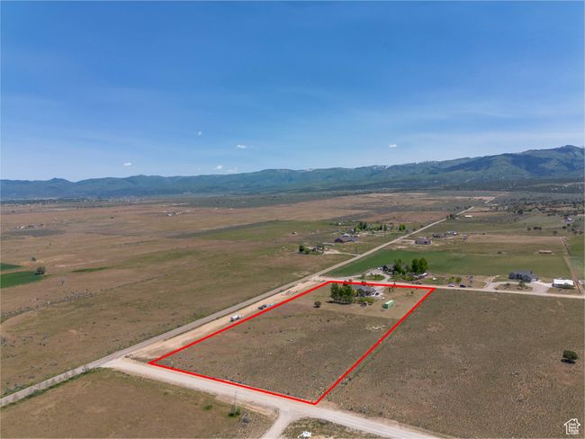 View of rural area with a mountain backdrop and property boundaries highlighted | Image 52