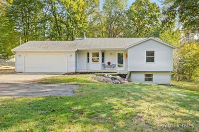 8454 Young Avenue Ne, House other with 3 bedrooms, 2 bathrooms and null parking in Rockford MI | Image 1