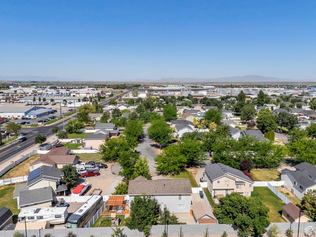 Aerial view of residential area with mountains | Image 33