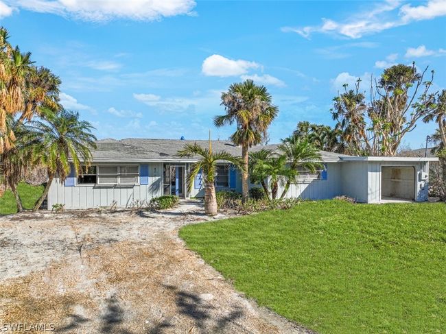 1057 Blue Heron Dr, House other with 3 bedrooms, 3 bathrooms and null parking in Sanibel FL | Image 4