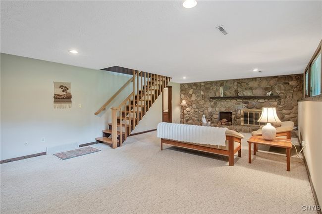 Finished basement with additional fireplace | Image 24