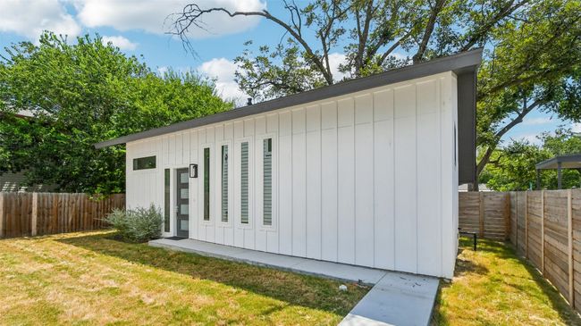 View of outbuilding featuring a fenced backyard | Image 27