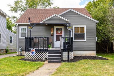 View of front of house featuring a front lawn | Image 1