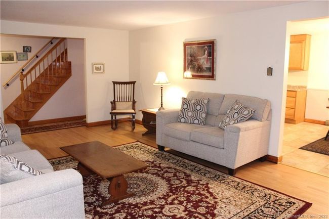Living room looking towards foyer. doorway to the right leads to the kichen. | Image 14