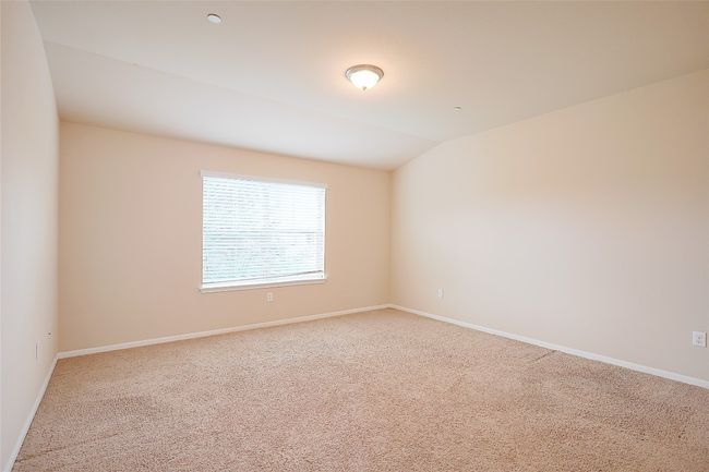 Spare room featuring carpet floors | Image 11