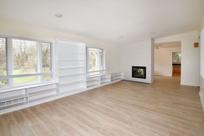 amazing family room with 2-way fireplace | Image 7
