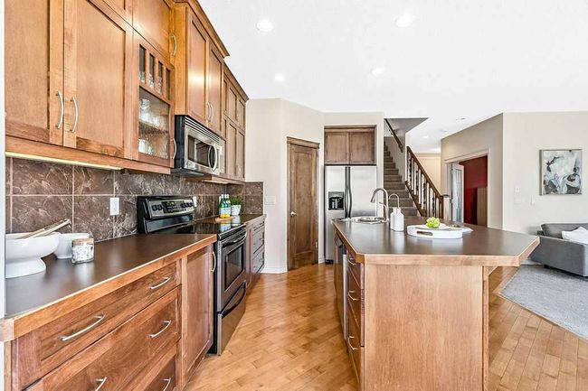 419 Cimarron Blvd, House other with 3 bedrooms, 3 bathrooms and 4 parking in Okotoks AB | Image 11