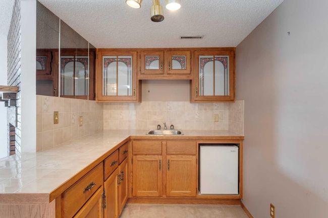 38 - 118 Strathcona Road Sw, Townhouse with 2 bedrooms, 2 bathrooms and 4 parking in Calgary AB | Image 24
