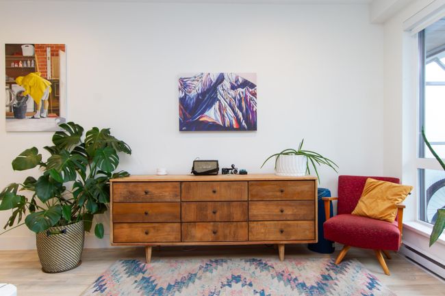 Sitting room with a baseboard heating unit and light wood-type flooring | Image 5