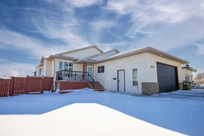 11209 90 Street, Home with 6 bedrooms, 3 bathrooms and 8 parking in Grande Prairie AB | Image 1