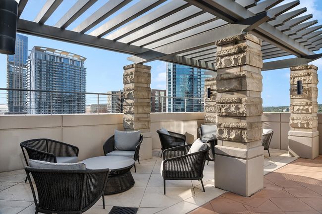 View of patio / terrace with a pergola, a city view, and outdoor lounge area | Image 18