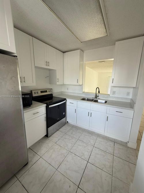 apt-108-8700 N Sherman Cir, Miramar, FL, 33025-2052 | Card Image
