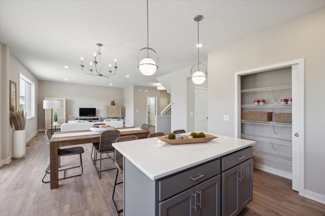 kitchen overlooks eating area and family room. This is not the actual home for sale, but photos of the same floorplan. Additional options may be shown. | Image 9