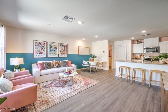 Living room with visible vents, light wood-type flooring, recessed lighting, and baseboards | Image 4