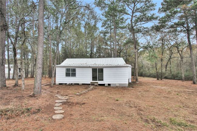 View of outdoor structure with entry steps | Image 16