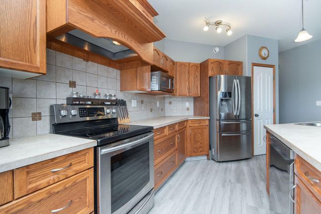 64 Kensington Close, Home with 5 bedrooms, 3 bathrooms and 3 parking in Red Deer AB | Image 9