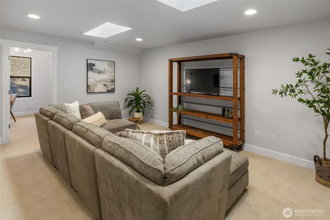 2nd floor family room with skylights. | Image 31