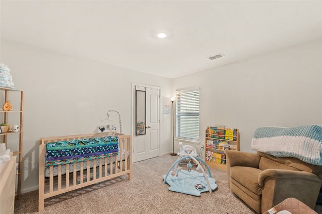 Bedroom featuring carpet flooring, baseboards, and recess lighting | Image 25
