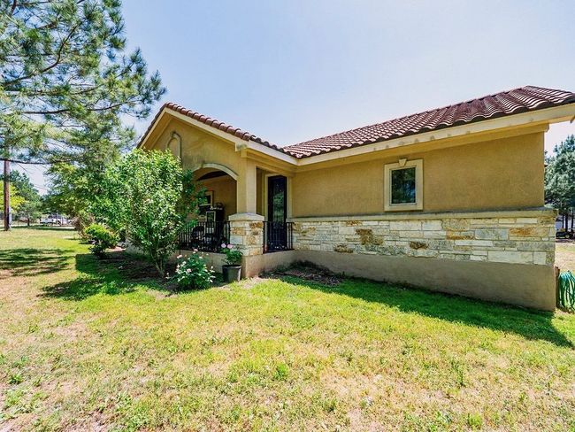 Home has Spanish style tiled roof | Image 33
