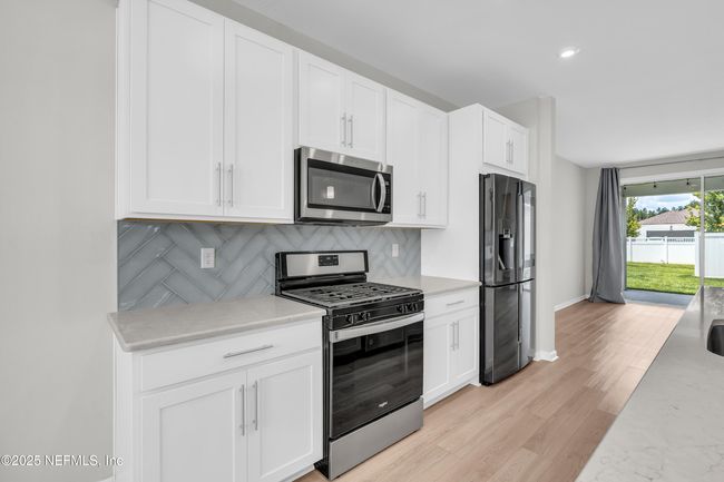 575 Buttonwood Loop, House other with 3 bedrooms, 2 bathrooms and null parking in Yulee FL | Image 17