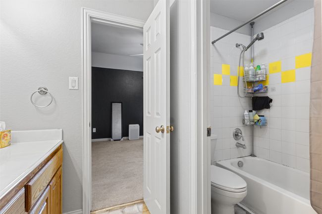 Full bathroom with vanity, toilet, and shower combination | Image 29