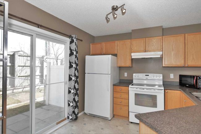121 Tuscany Springs Gardens Nw, Home with 2 bedrooms, 2 bathrooms and 2 parking in Calgary AB | Image 2