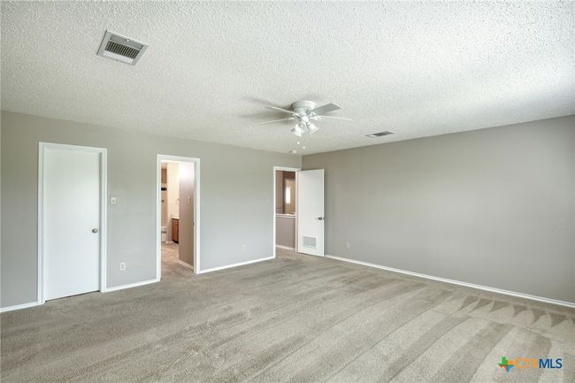 View from Primary bedroom towards closet and primary bath | Image 19