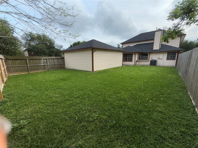 view of the back yard | Image 26