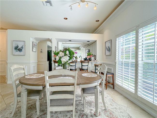 View of tiled dining area | Image 32