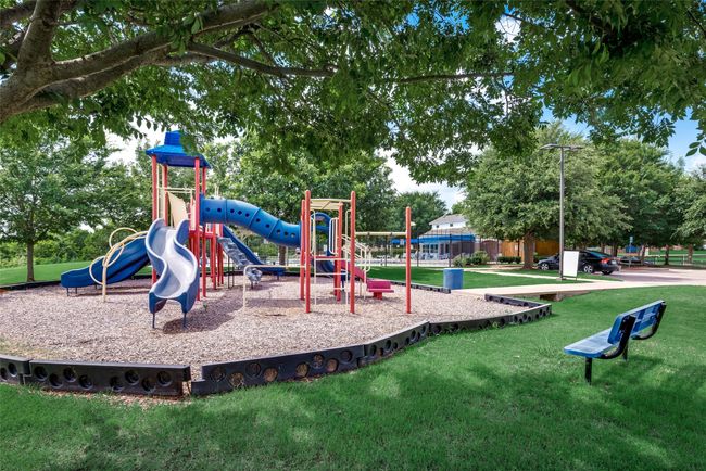 Community jungle gym featuring a yard | Image 37