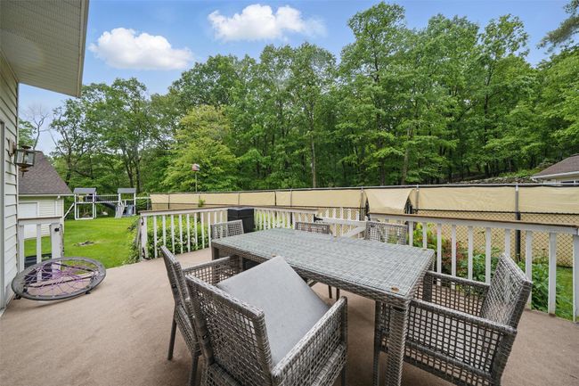 View of patio / terrace with outdoor dining area | Image 42