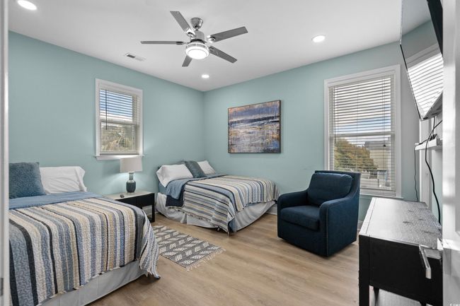 Bedroom with recessed lighting, visible vents, a ceiling fan, and light wood-style flooring | Image 22