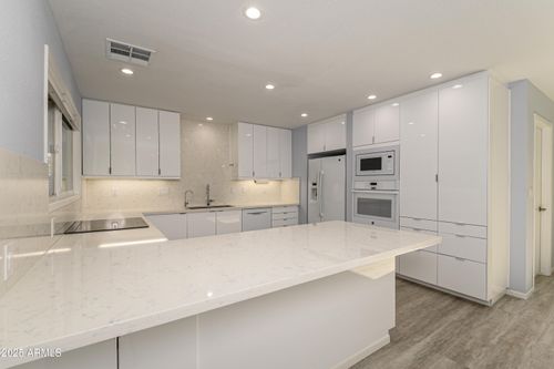 12727 W Maplewood Dr, Sun City West, AZ, 85375-4619 | Card Image